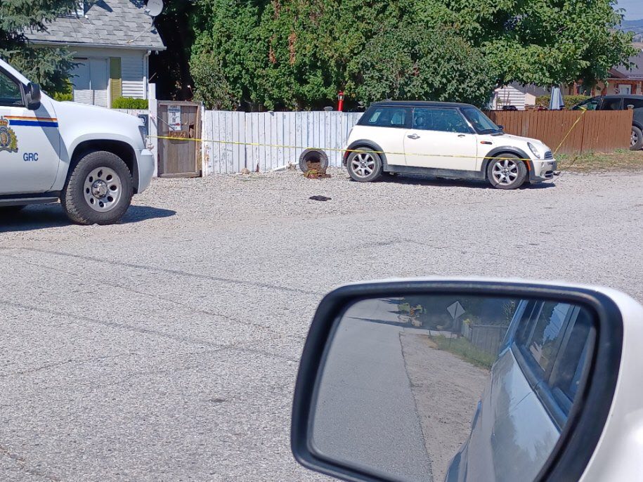 As of Sunday afternoon, Maple Street has reopened but a home and mini cooper remain behind police tape.