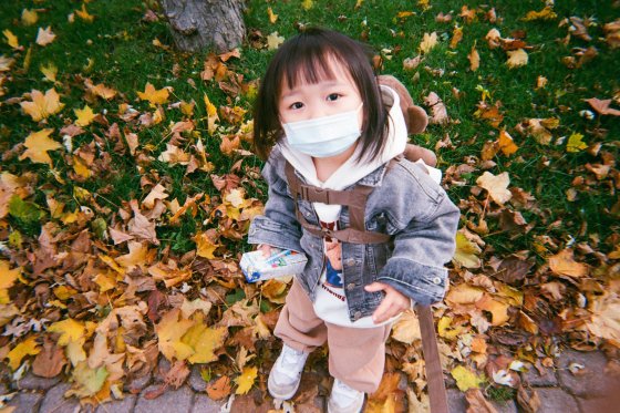 Photo of a child wearing a mask