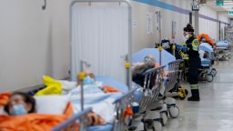 Patients in the emergency department of Humber River Hospital in Ontario line the hallways, due to overcapacity in the ER.