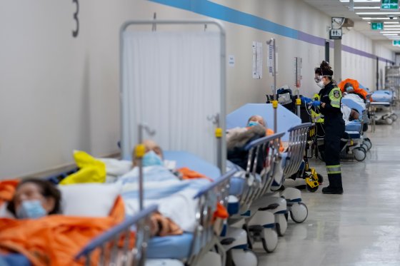 Patients in the emergency department of Humber River Hospital in Ontario line the hallways, due to overcapacity in the ER.