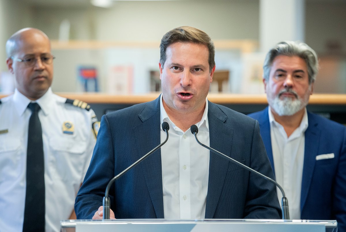 Public Safety Minister Marco Mendicino speaks during a news conference alongside Canadian Heritage Minister Pablo Rodriguez, right, and station 49 Police Chief Emmanuel Anglade in Montreal, Thursday, August 4, 2022, where he announced federal support for organizations on the front lines of the fight against gun and gang violence in Quebec. 