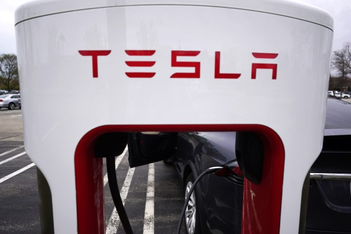 Tesla Supercharger is seen at Willow Festival shopping plaza parking lot in Northbrook, Ill., on May 5, 2022. 