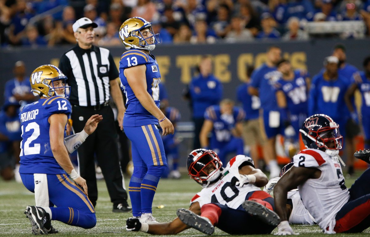 Winnipeg Blue Bombers kicker Marc Liegghio (13) reacts as he watches his field goal attempt go wide during overtime of CFL action against the Montreal Alouettes in Winnipeg Thursday, August 11, 2022.