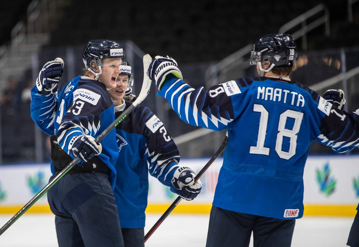 Finland’s Roby Jarventie (13), Aleksi Heimosalmi (21) and Joel Maatta (18) celebrate a goal against Germany during third period IIHF World Junior Hockey Championship quarterfinal action in Edmonton on Wednesday August 17, 2022.