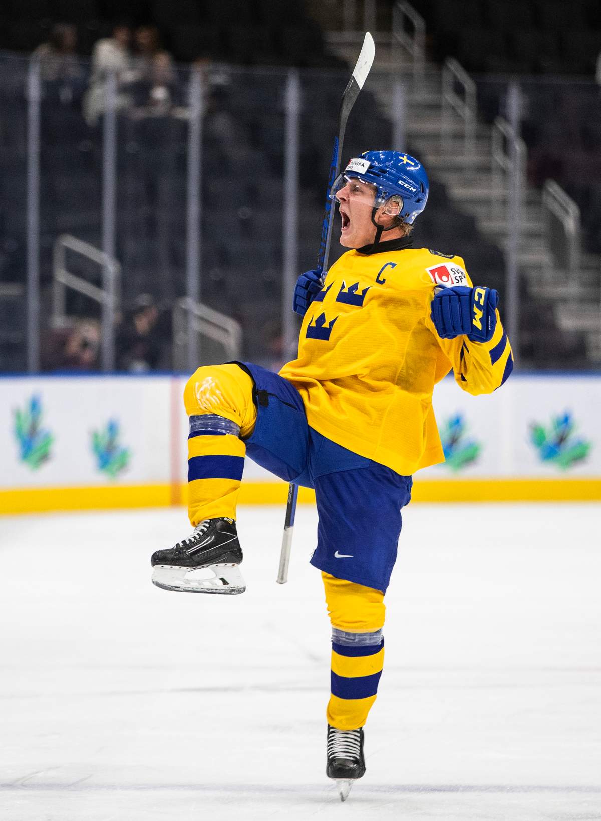 Sweden’s Emil Andrae (4) celebrates a goal against Latvia during third period IIHF World Junior Hockey Championship quarterfinal action in Edmonton on Wednesday August 17, 2022.