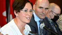 Dr. Leigh Chapman, Canada's Chief Nursing Officer, speaks as Minister of Health Jean-Yves Duclos listens, during a news conference in Ottawa, on Tuesday, Aug. 23, 2022.