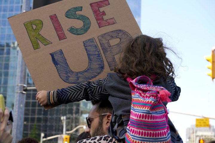 A young protester holds a sign at Queen’s Park during the climate strike rally in Toronto, Ont., Sept. 27, 2019. 