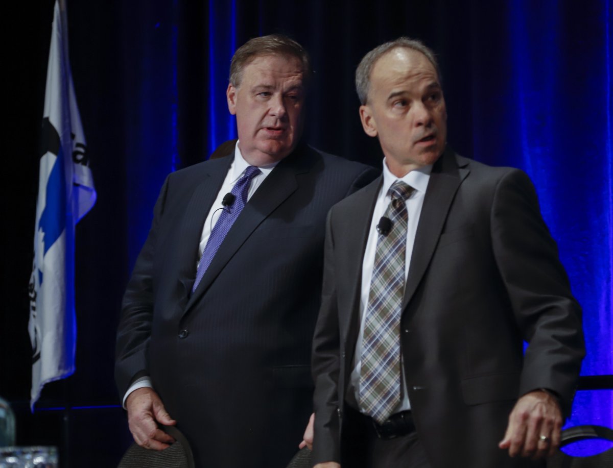 Canadian Natural Resources Ltd. chairman Murray Edwards, left, and president Tim McKay prepare to address the company's annual meeting in Calgary, Thursday, May 9, 2019.