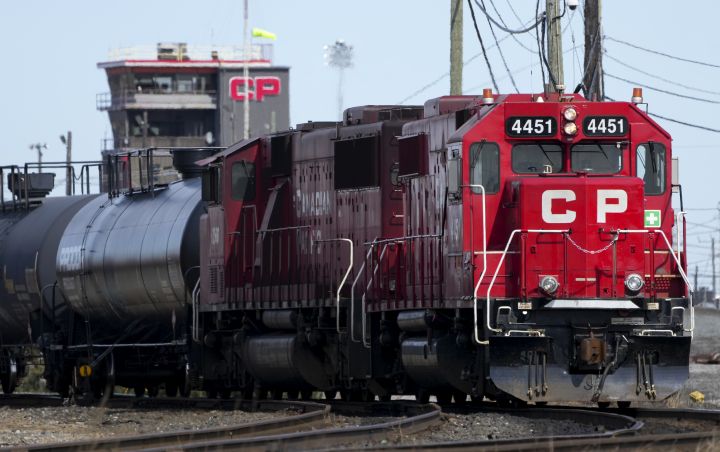 Canadian Pacific Railway trains sit idle on the train tracks due to the strike at the main CP Rail train yard in Toronto on Monday, March 21, 2022. 