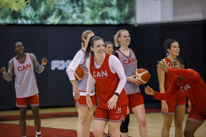 Bridget Carleton jokes with team mates following Canada’s senior women’s national team practice in Toronto, Friday, July 8, 2022.