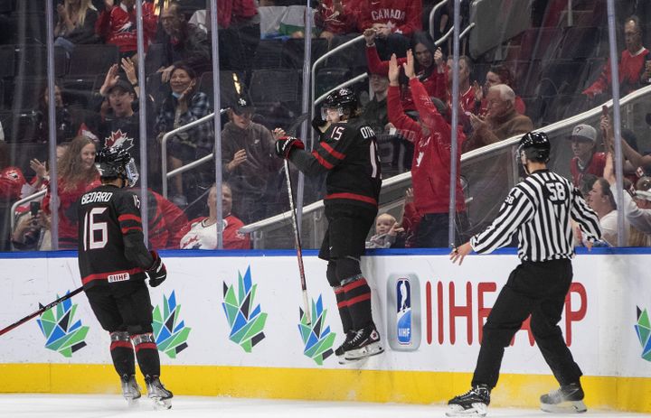 Canada’s Connor Bedard (16) and Brennan Othmann (15) celebrate a goal against Finland during first period IIHF World Junior Hockey Championship action in Edmonton on Monday August 15, 2022.