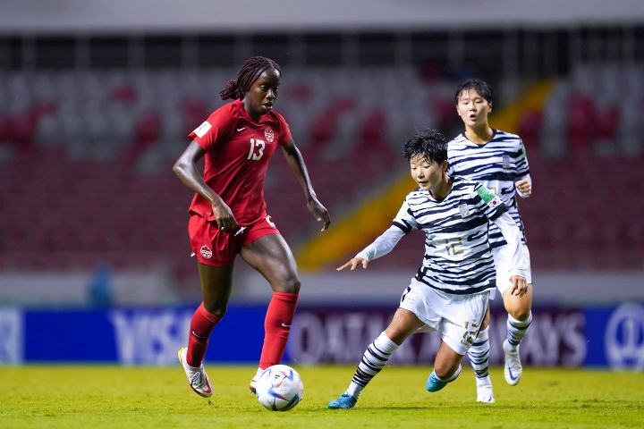 Canada's Simi Awujo, left, controls the ball during FIFA U-20 Women's World Cup action as South Korea's Lee Seran defends in San Jose, Costa Rica on Thursday Aug. 11, 2022. 
