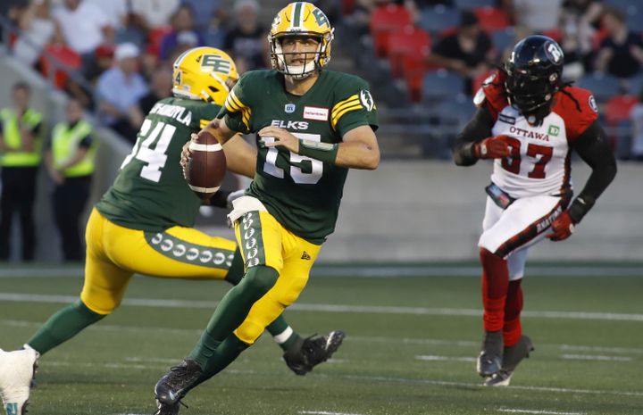 Edmonton Elks quarterback Taylor Cornelius (15) runs with the ball during first half CFL action against the Ottawa Redblacks in Ottawa on Friday, August 19, 2022. 