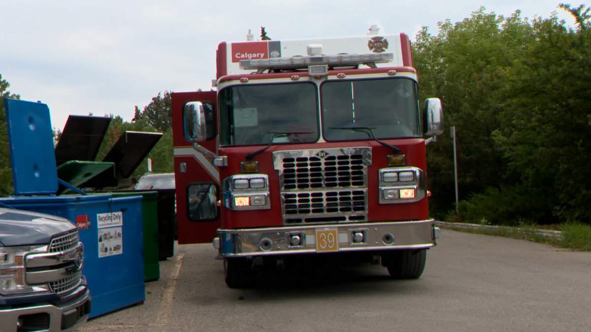 Calgary Fire Department hazardous materials team is pictured at the Glenmore Reservoir on Aug. 25, 2022, following reports of a hydrocarbon spill.