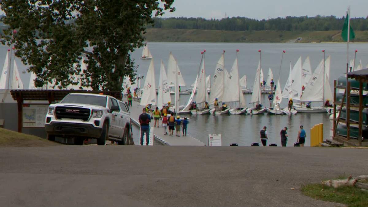 Calgary Fire Department hazardous materials team is pictured at the Glenmore Reservoir on Aug. 25, 2022, following reports of a hydrocarbon spill.