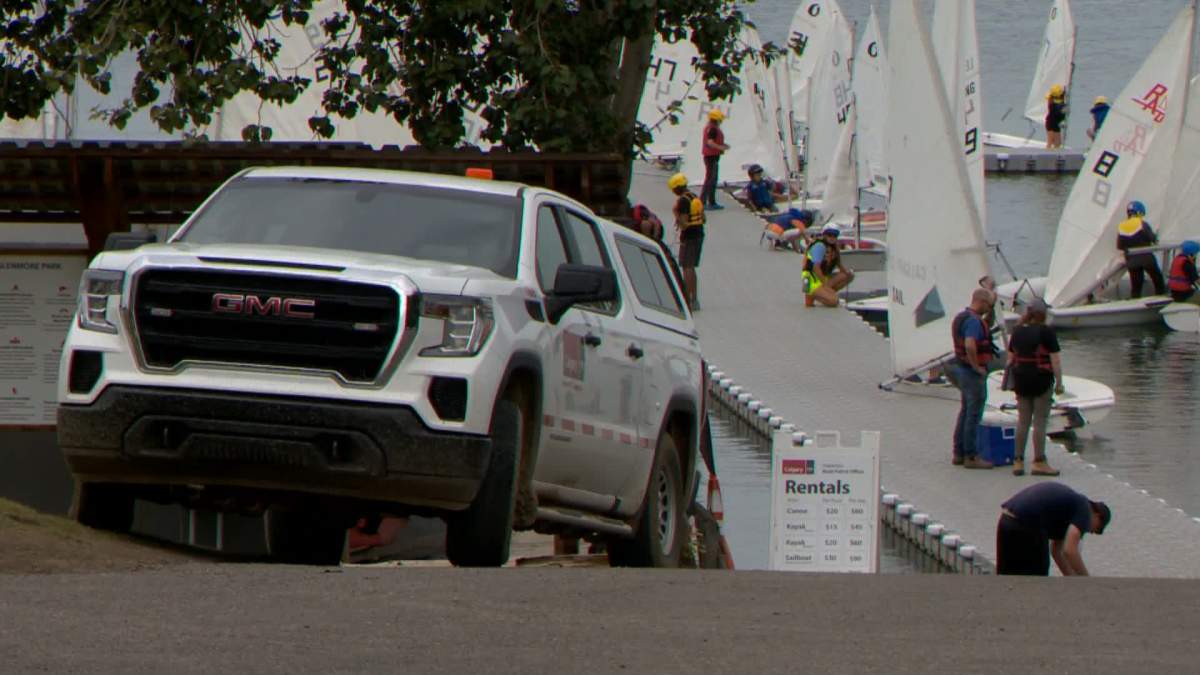 Calgary Fire Department hazardous materials team is pictured at the Glenmore Reservoir on Aug. 25, 2022, following reports of a hydrocarbon spill.