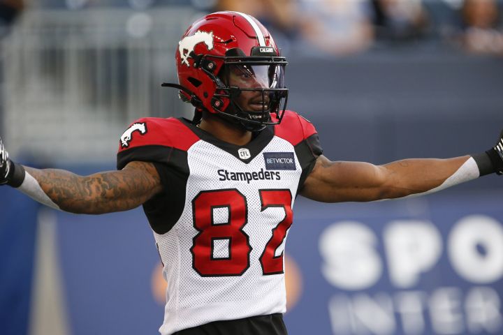 Calgary Stampeders’ Malik Henry (82) celebrates his touchdown against the Winnipeg Blue Bombers during the first half CFL action in Winnipeg Thursday, August 25, 2022.