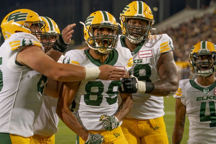 Edmonton Elks wide receiver Kenny Lawler (89) celebrates his touchdown that brought his team within one point of the Hamilton Tiger Cats late in the during fourth quarter of CFL football game action in Hamilton, Ont., Friday, July 1, 2022. 