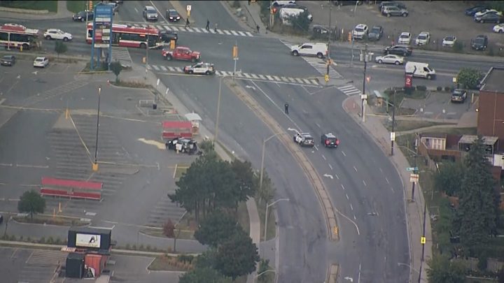 A crashed cruiser in the parking lot of a Metro grocery store near Keele Street and Lawrence Avenue.
