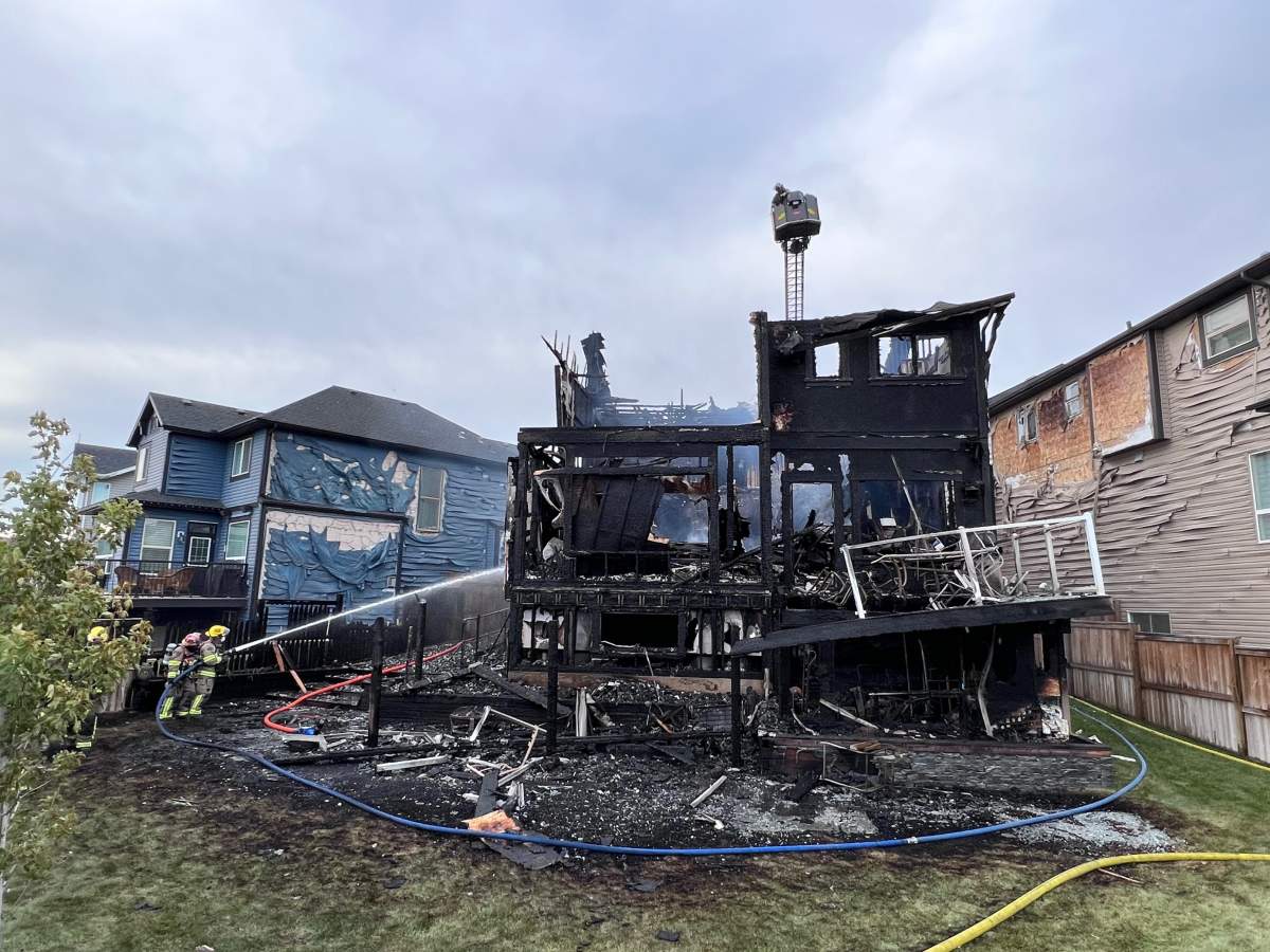 Airdrie emergency crews fight to contain residential structure fire - image