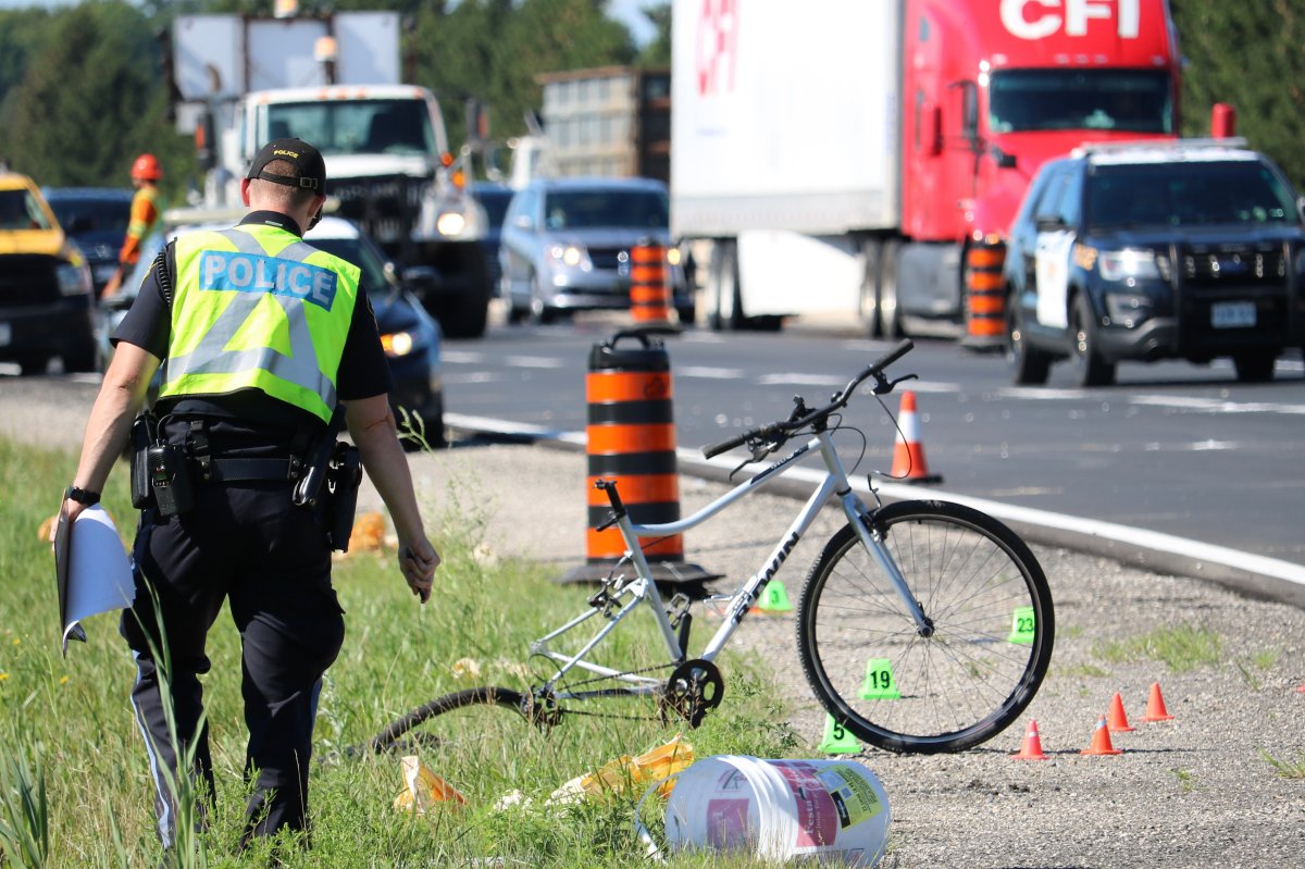 Middlesex County OPP investigating a fatal collision on Highway 401 involving a cyclist and a vehicle in the eastbound lane near Colonel Talbot Road, London. August 11, 2022.