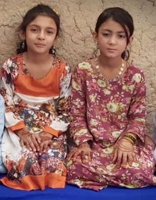 Nazifa Ahmadi, left, was killed by the Taliban on Dec. 10 while her family was waiting to be evacuated to Canada.