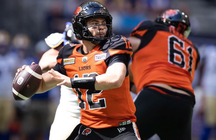 B.C. Lions quarterback Nathan Rourke passes during the first half of CFL football game against the Winnipeg Blue Bombers in Vancouver, on Saturday, July 9, 2022. 