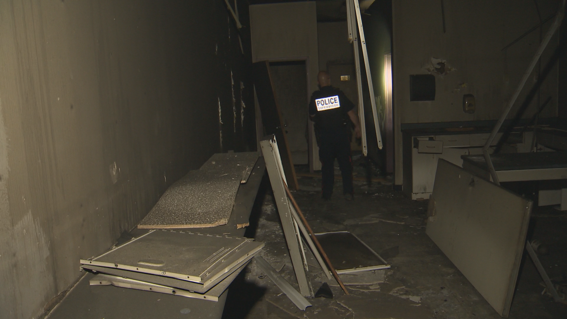 Winnipeg police search a vacant and burned out building