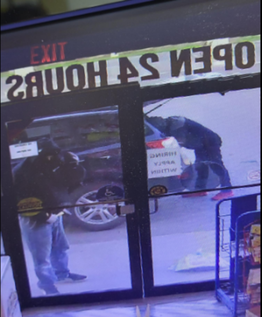 Security footage shows two suspects breaking into a store in Quinte West.