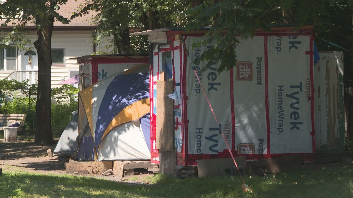 Two tents and two structures shown at Meagher Park Thursday