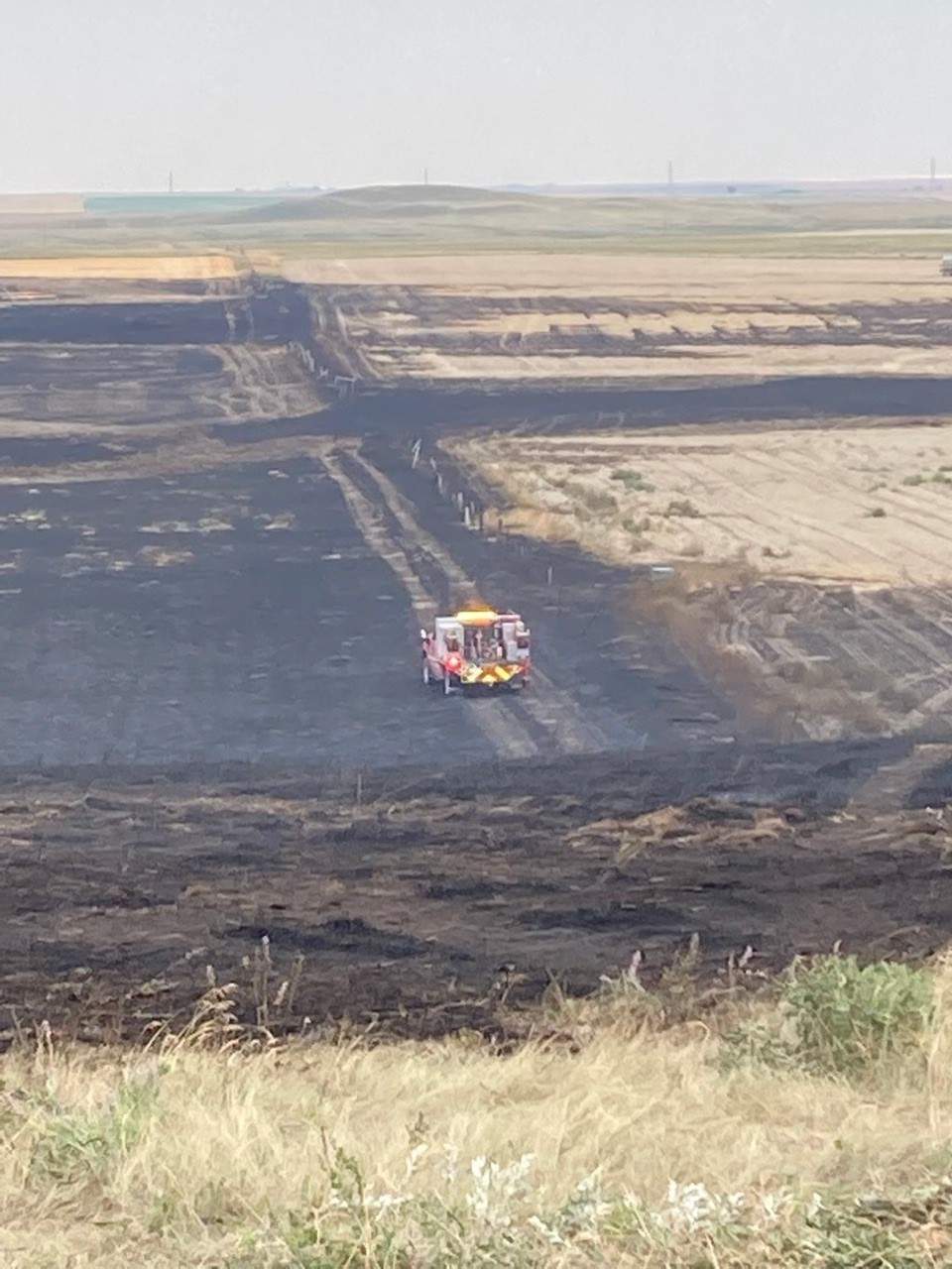 A weekend fire burned roughly 640 acres of grassland and fence southwest of Claresholm on Aug. 20, 2022.