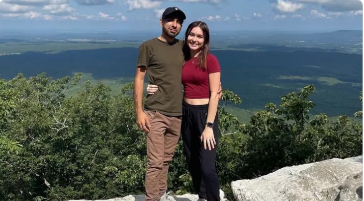 Adam Simjee and Mikayla Paulus appear standing with their arms around one another in this undated photo.