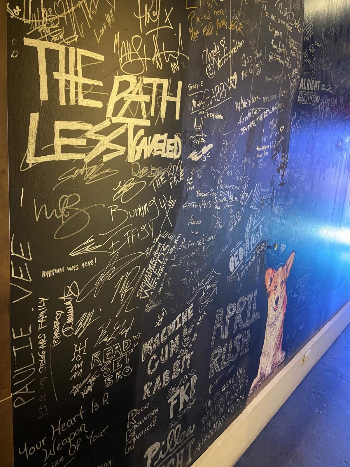 Wall inside Blind Beggar with all the artist’s signatures.