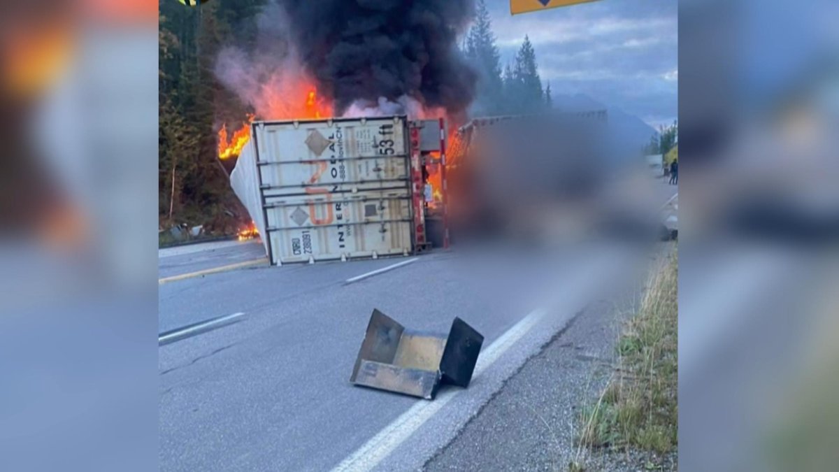 A fiery crash east of Golden closed Highway 1 in both directions. 