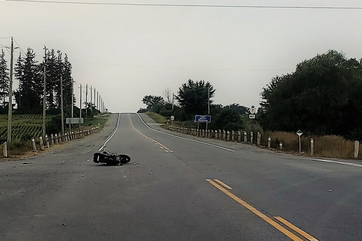 Four people were left injured after a motorcycle and car collided on Highway 7 near the border of Guelph and Waterloo Region on Sunday night.