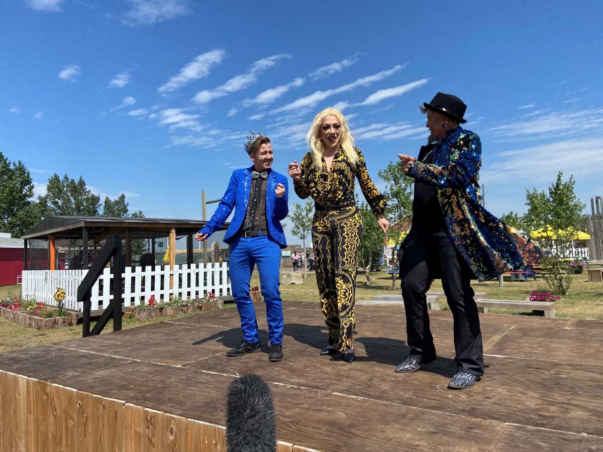 Drag artists perform on stage at Cobb’s Adventure Park.