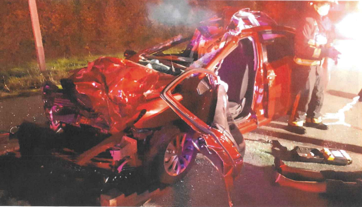 The mangled wreck of Joan Sherry’s Nissan Sentra at the scene on October 1, 2021.