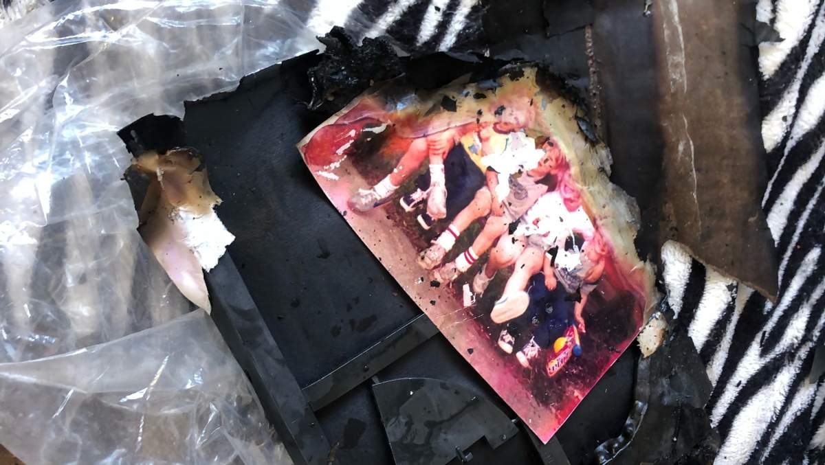 A burned photograph found in Lynne Mishele's home after the crash.