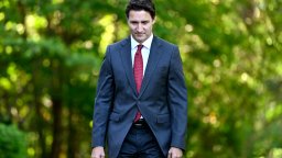 Prime Minister Justin Trudeau arrives for a small cabinet shuffle
