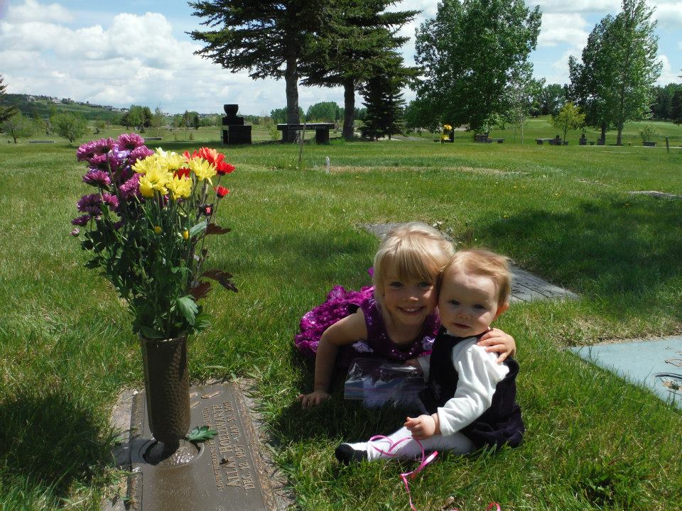 Arialla and Nalla at their father’s gravesite.