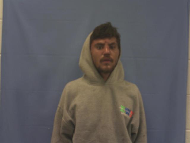Randal Worcester's mugshot. He is wearing a beige hoodie.