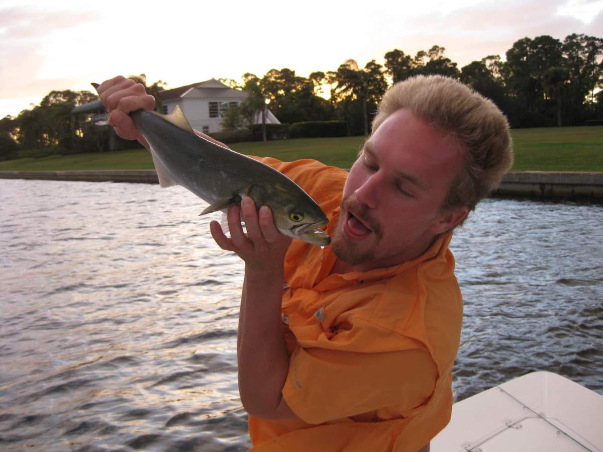 Sean Nagle posing with a fish,