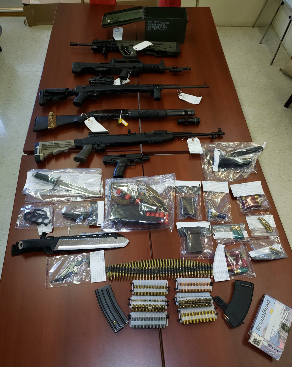 A man is in custody and several loaded guns were seized after a police operation last week.