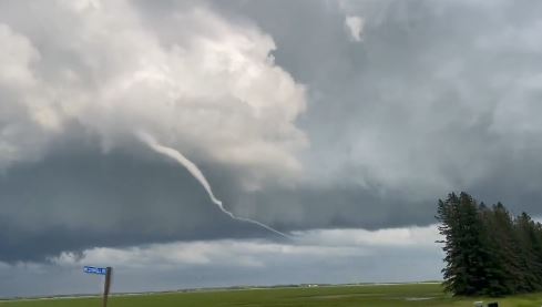 A tornado forms north of Winnipeg.