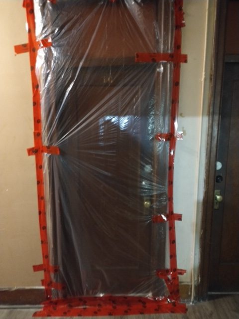 The door of unit 16, where Van Chung Pham lived, in the weeks after his body—and the decomposing remains of two others—were discovered.