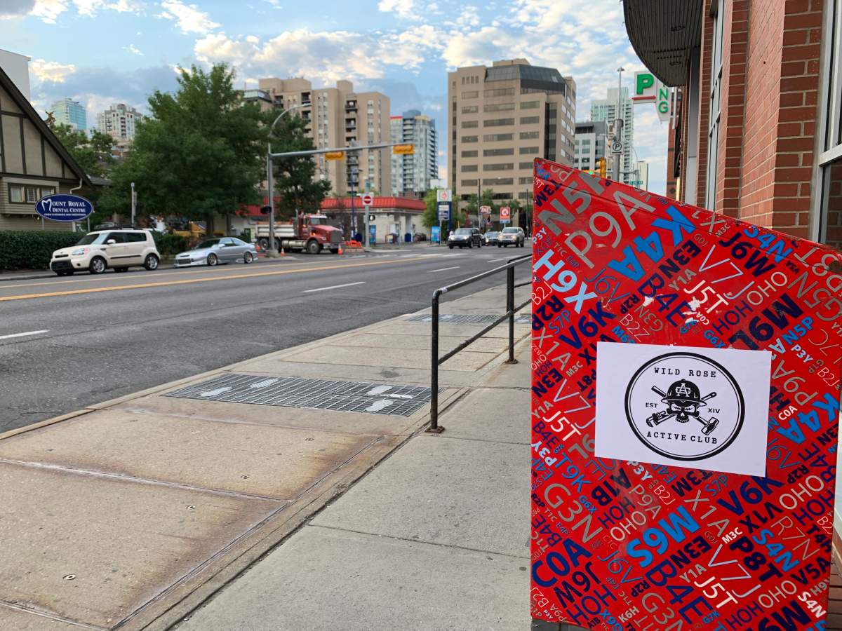 The Wild Rose active club logo is shown stuck on a Canada Post box in downtown Calgary, pictured on August 15, 2022.