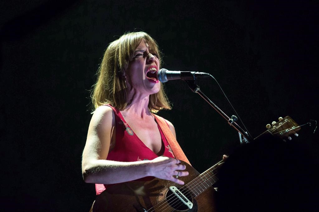 Feist performs during the Polaris Music Prize gala in Toronto on September 18, 2017. The singer says she's leaving Arcade Fire's "We" tour due to sexual misconduct allegations against lead singer Win Butler. 
