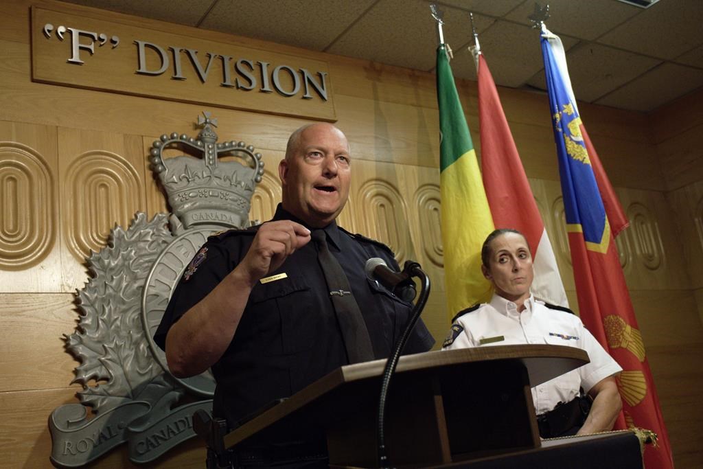Regina police Chief Evan Bray, left, speaks while RCMP Assistant Commissioner Rhonda Blackmore, right, looks on during a press conference in Regina on Sept. 5, 2022. THE CANADIAN PRESS/Michael Bell