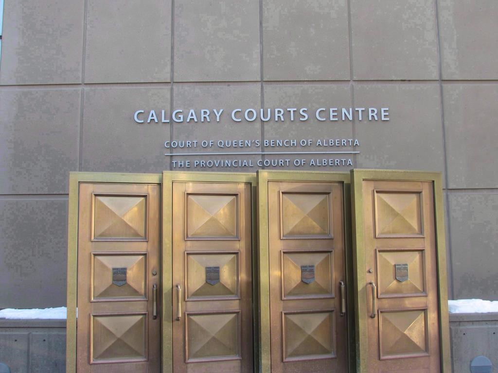 The sign at the Calgary Courts Centre in Calgary is shown on Jan. 5, 2018. Last week, the city's last pay phone was removed from the Calgary Courts Centre. THE CANADIAN PRESS/Bill Graveland.