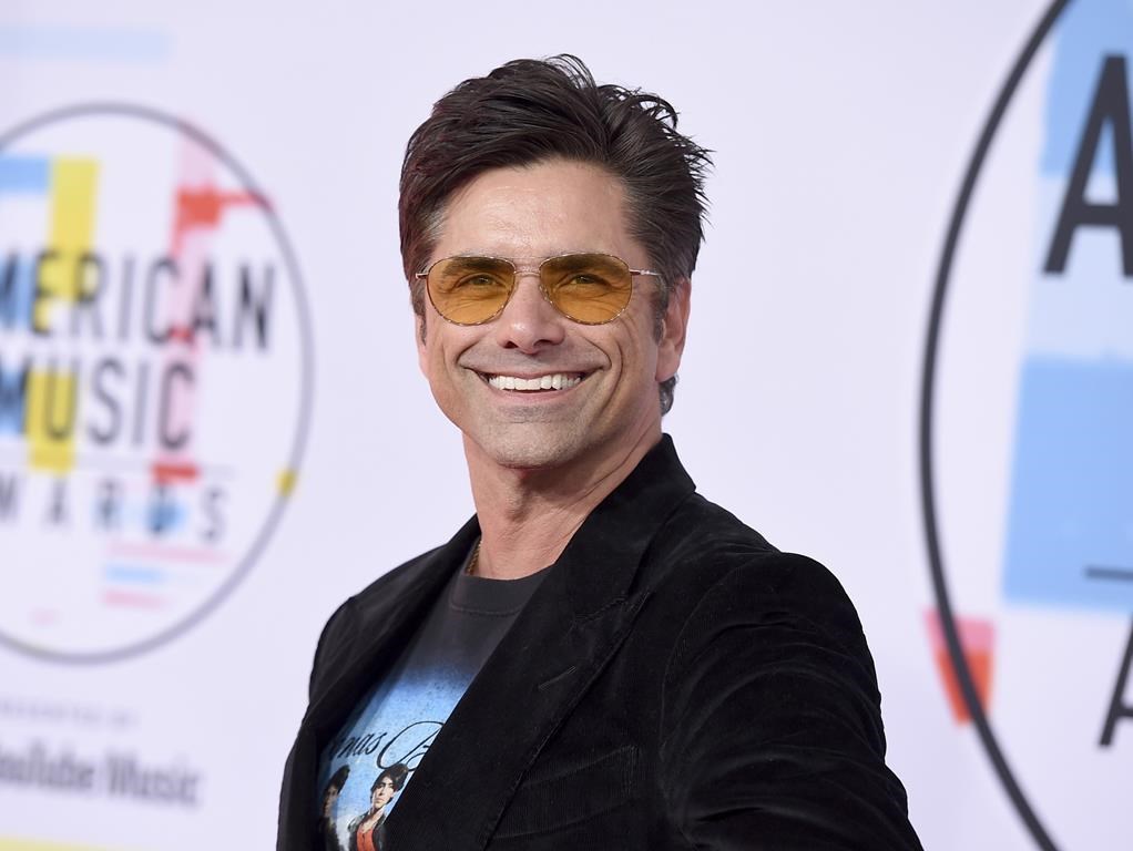 John Stamos appears at the American Music Awards in Los Angeles on Oct. 9, 2018.